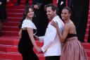 Selena Gomez, Edgar Ramirez and Zoe Saldana attend the Emilia Perez premiere during the 77th Cannes Film Festival (Doug Peters/PA)