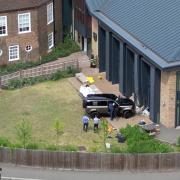 Two eight-year-old girls were killed as a Land Rover Defender crashed into the school