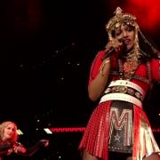 Mitcham rapper MIA on stage at the Superbowl with Madonna